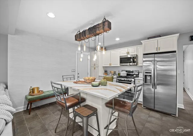 Photo 4 of Single family home for sale at 609 Ridgewood Rd, Streamwood, IL 60107 | MLS# 12786477 | Listing updated on 2026-10-21