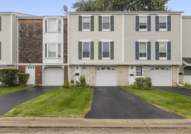Photo 1 of Townhouse for sale at 1990 Oxford Ln, Hoffman Estates, IL 60169 | MLS# 12786809 | Listing updated on 2026-10-22