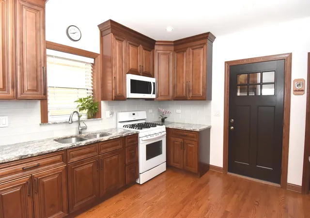 Photo 3 of Multi family home for sale at 2918 N 74th Avenue, Elmwood Park, IL 60707 | MLS# 12787104 | Listing updated on 2026-10-23