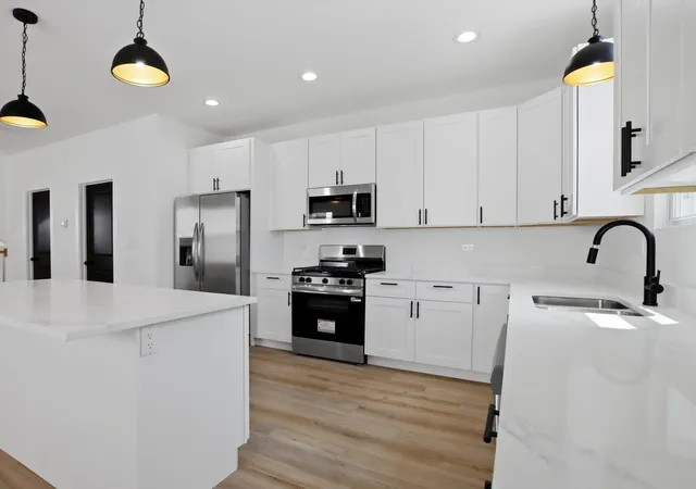 Photo 4 of Single family home for sale at 816 N Leamington Ave, Chicago, IL 60651 | MLS# 12788366 | Listing updated on 2026-10-22