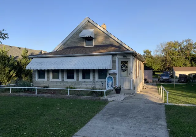 Single family home for sale at 1124 N Hickory St, Joliet, IL 60435 | MLS# 12788393