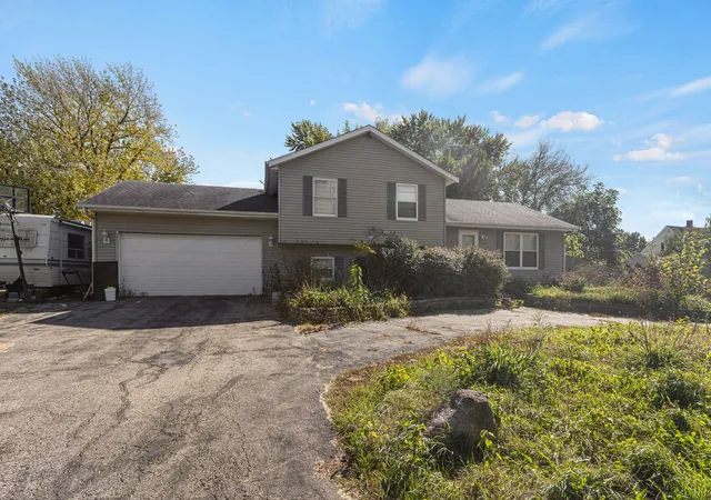 Single family home for sale at 200 Dunlap St, Harvard, IL 60033 | MLS# 12789024