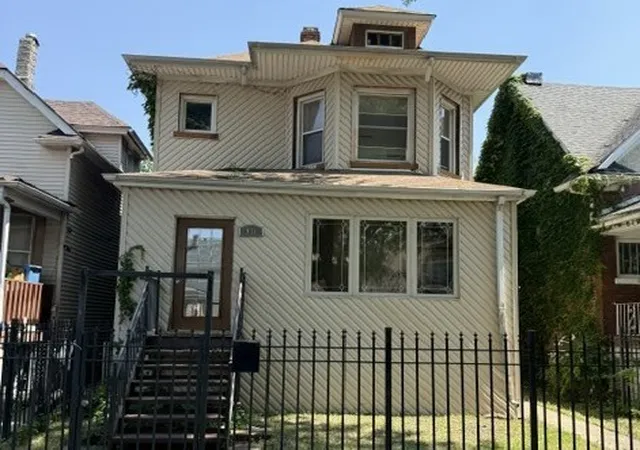 Single family home for sale at 911 N Lawler Ave, Chicago, IL 60651 | MLS# 12789704
