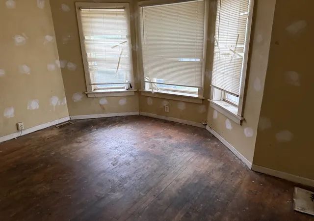 Photo 4 of Single family home for sale at 911 N Lawler Ave, Chicago, IL 60651 | MLS# 12789704 | Listing updated on 2026-10-28
