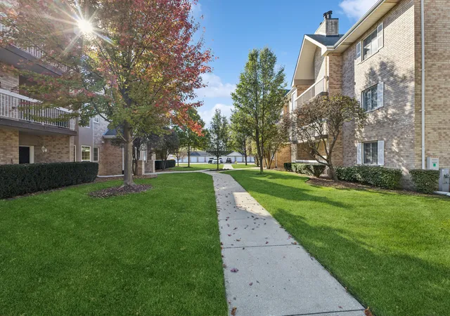 Listing Photo 1 - Condo for sale in building located at 7799 Bristol Park Dr, Tinley Park, IL 60477 - Unit #2SW