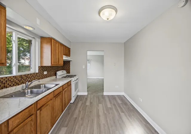 Photo 3 of Multi family home for sale at 808 Mackinaw Ave, Calumet City, IL 60409 | MLS# 12790158 | Listing updated on 2026-10-23
