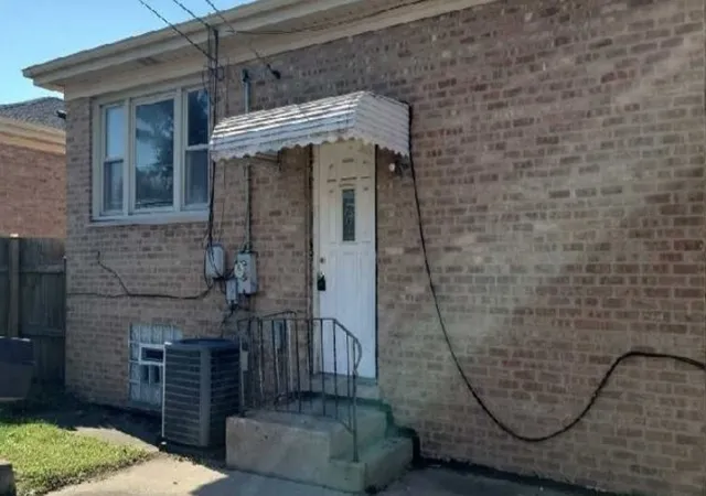 Photo 2 of Single family home for sale at 539 Escanaba Ave, Calumet City, IL 60409 | MLS# 12790263 | Listing updated on 2026-10-22