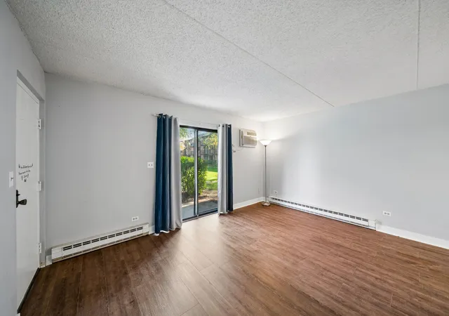 Listing Photo 1 - Condo for sale in building located at 230 Klein Creek Ct, Carol Stream, IL 60188 - Unit #1A
