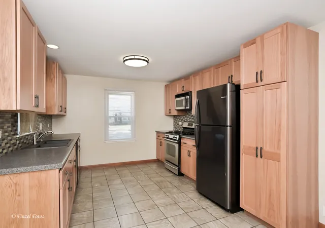 Photo 3 of Single family home for sale at 1168 Erie St, Elgin, IL 60123 | MLS# 12790788 | Listing updated on 2026-10-22