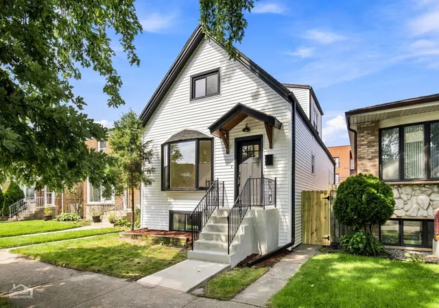 Single family home for sale at 5722 W Grover St, Chicago, IL 60630 | MLS# 12790951