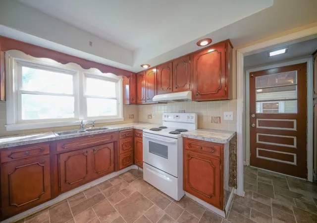 Photo 3 of Multi family home for sale at 2119 Sandy Holw Rd, Rockford, IL 61109 | MLS# 12791183 | Listing updated on 2026-10-22