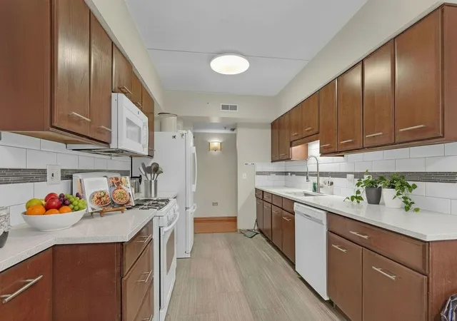 Listing Photo 1 - Condo for sale in building located at 1349 E Washington St, Des Plaines, IL 60016 - Unit #302