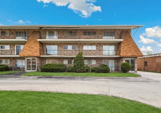 Listing Photo 1 - Condo for sale in building located at 15335 Martin Luther King Jr Dr, Dolton, IL 60419 - Unit #21