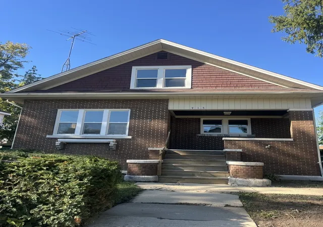 Single family home for sale at 915 N Vine St, Joliet, IL 60435 | MLS# 12792334
