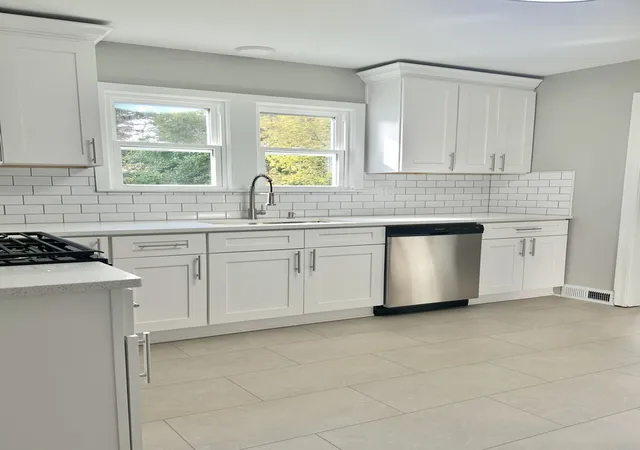 Photo 2 of Single family home for sale at 693 Enterprise St, Elgin, IL 60120 | MLS# 12793511 | Listing updated on 2026-10-27