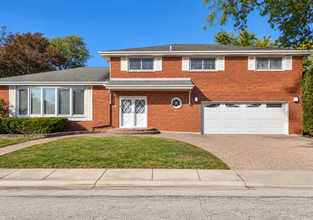 Single family home for sale at 7057 N Kilpatrick Ave, Lincolnwood, IL 60712 | MLS# 12793569