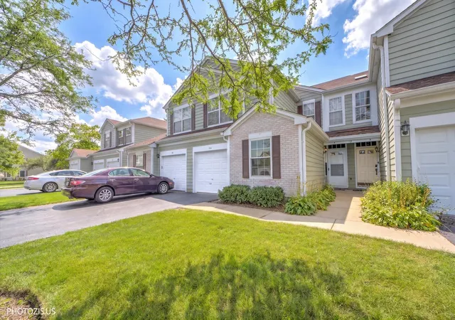 Photo 2 of Townhouse for sale at 12 Taft Ct #A, Streamwood, IL 60107 | MLS# 12793641 | Listing updated on 2026-10-28