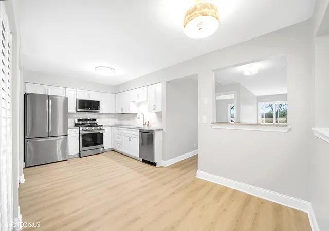 Photo 3 of Townhouse for sale at 12 Taft Ct #A, Streamwood, IL 60107 | MLS# 12793641 | Listing updated on 2026-10-28