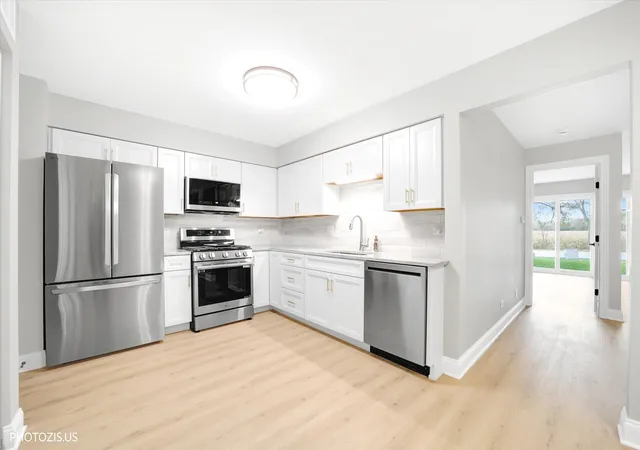 Photo 4 of Townhouse for sale at 12 Taft Ct #A, Streamwood, IL 60107 | MLS# 12793641 | Listing updated on 2026-10-28