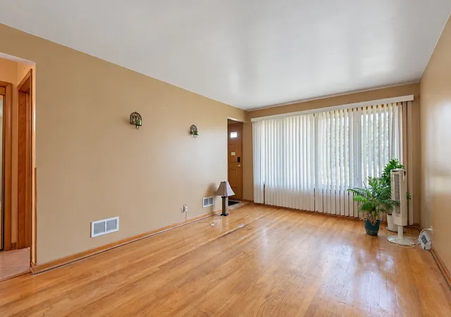 Photo 2 of Single family home for sale at 6449 S Lamon Ave, Chicago, IL 60638 | MLS# 12793698 | Listing updated on 2026-10-28