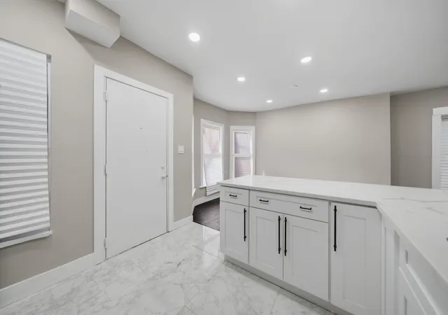 Photo 4 of Single family home for sale at 122 N Long Ave, Chicago, IL 60644 | MLS# 12793783 | Listing updated on 2026-10-27
