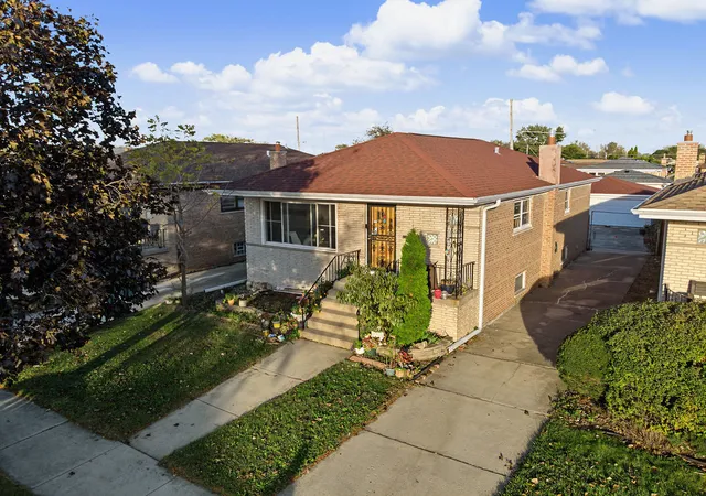 Photo 1 of Single family home for sale at 445 Manistee Ave, Calumet City, IL 60409 | MLS# 12793853 | Listing updated on 2026-10-27