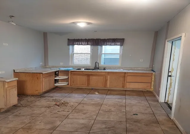 Photo 3 of Single family home for sale at 7638 S Rhodes Ave, Chicago, IL 60619 | MLS# 12793964 | Listing updated on 2026-10-27