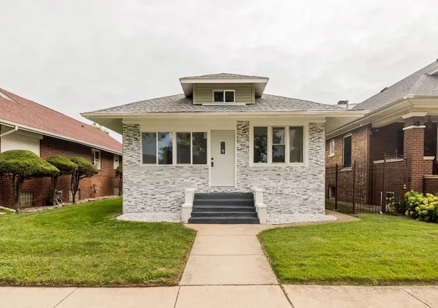Single family home for sale at 7617 S Crandon Ave, Chicago, IL 60649 | MLS# 12794050