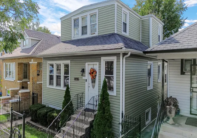 Photo 2 of Single family home for sale at 2106 N Narragansett Ave, Chicago, IL 60639 | MLS# 12794711 | Listing updated on 2026-10-27