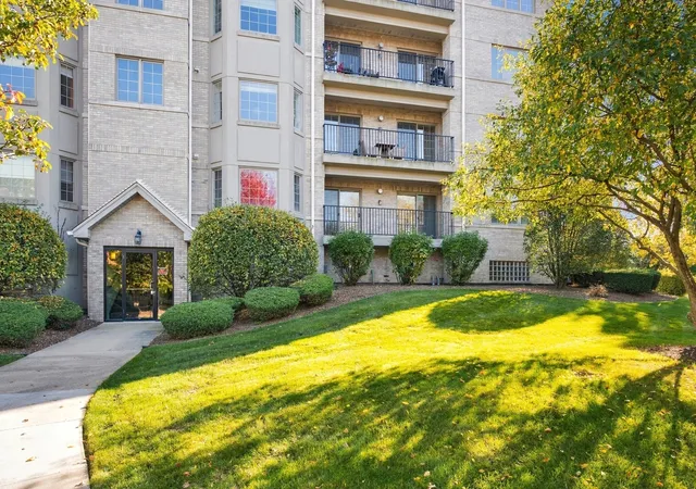 Listing Photo 1 - Condo for sale in building located at 8505 Woodward Ave, Woodridge, IL 60517 - Unit #102