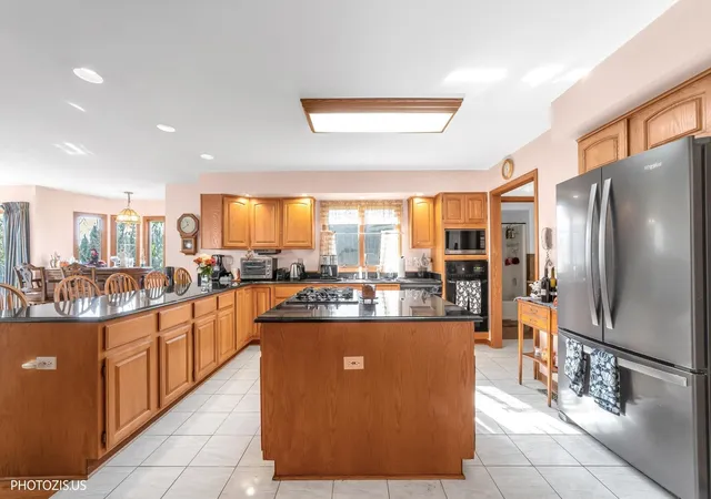 Photo 3 of Single family home for sale at 1341 Portage Ln, Woodstock, IL 60098 | MLS# 12794927 | Listing updated on 2026-10-28