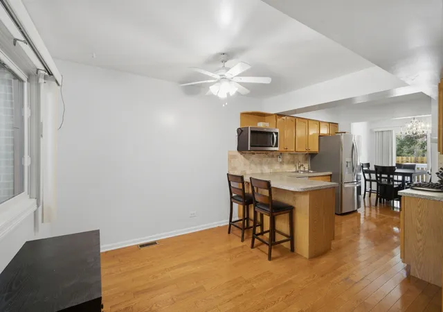 Photo 2 of Townhouse for sale at 411 Hickory Dr, Wheeling, IL 60090 | MLS# 12794961 | Listing updated on 2026-10-28