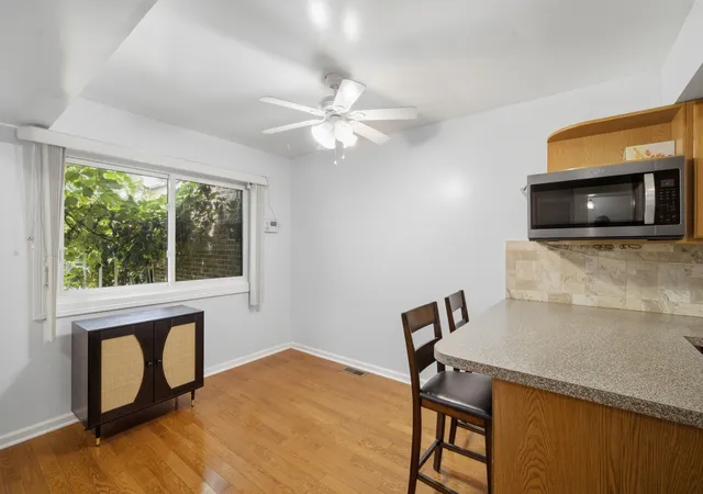 Photo 3 of Townhouse for sale at 411 Hickory Dr, Wheeling, IL 60090 | MLS# 12794961 | Listing updated on 2026-10-28