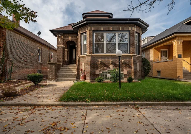 Single family home for sale at 8542 S Ada St, Chicago, IL 60620 | MLS# 12795351