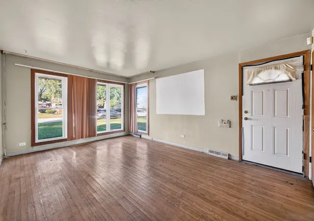 Photo 2 of Single family home for sale at 14717 Avalon Ave, Dolton, IL 60419 | MLS# 12795616 | Listing updated on 2026-10-27