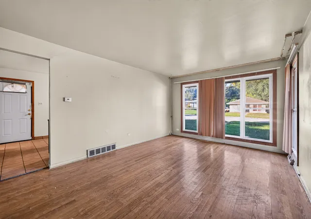 Photo 3 of Single family home for sale at 14717 Avalon Ave, Dolton, IL 60419 | MLS# 12795616 | Listing updated on 2026-10-27