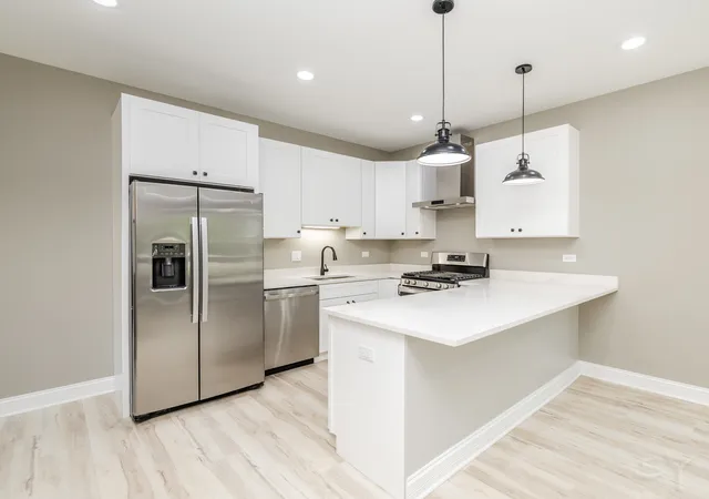 Photo 3 of House for sale at 1127 N Parkside Ave, Chicago, IL 60651 | MLS# 12795646 | Listing updated on 2026-10-29