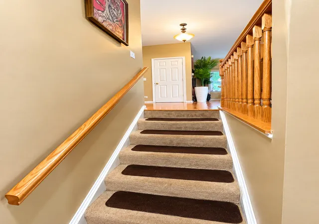 Photo 2 of Townhouse for sale at 11 Monarch Dr, Streamwood, IL 60107 | MLS# 12795715 | Listing updated on 2026-10-28