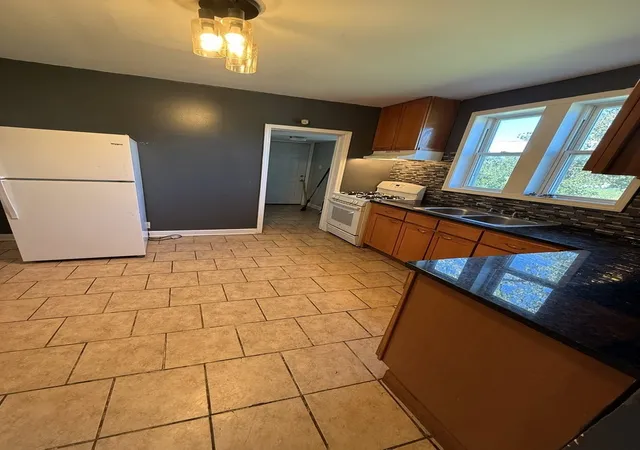 Photo 3 of Single family home for sale at 7916 S Normal Ave, Chicago, IL 60620 | MLS# 12797105 | Listing updated on 2026-10-29