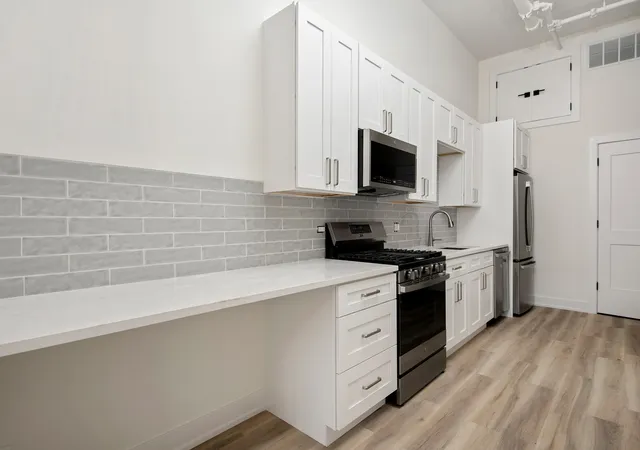 Listing Photo 1 - Condo for sale in building located at 2915 W Belmont Ave, Chicago, IL 60618 - Unit #1B