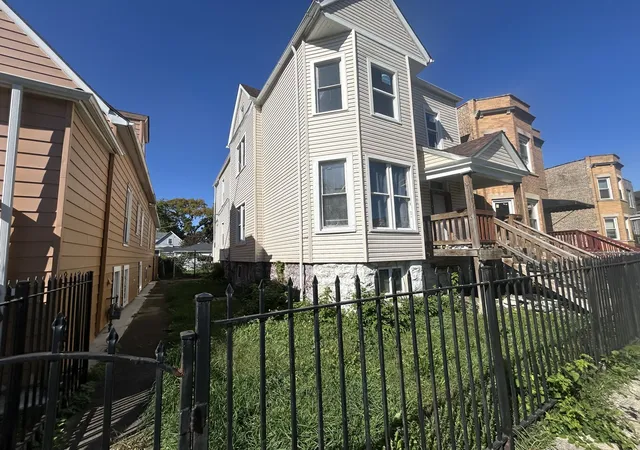 Photo 2 of Multi family home for sale at 414 N Lawler Ave, Chicago, IL 60644 | MLS# 12797627 | Listing updated on 2026-10-30