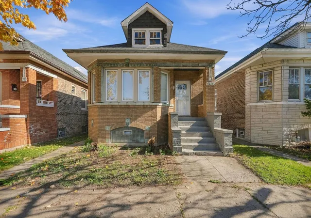 Single family home for sale at 9613 S Greenwood Ave, Chicago, IL 60628 | MLS# 12797765