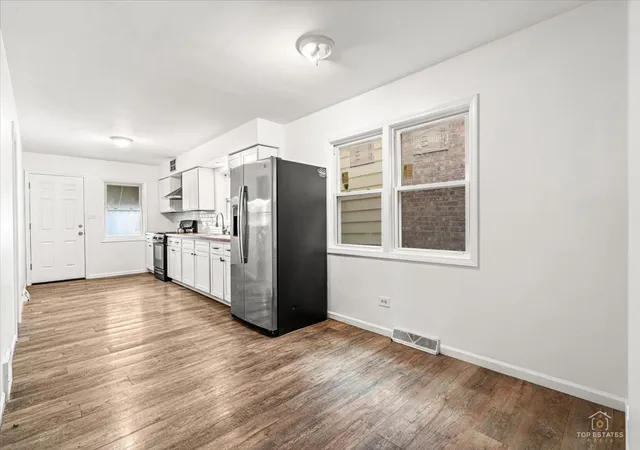 Photo 3 of Multi family home for sale at 1242 Wenonah Ave, Berwyn, IL 60402 | MLS# 12798200 | Listing updated on 2026-10-31