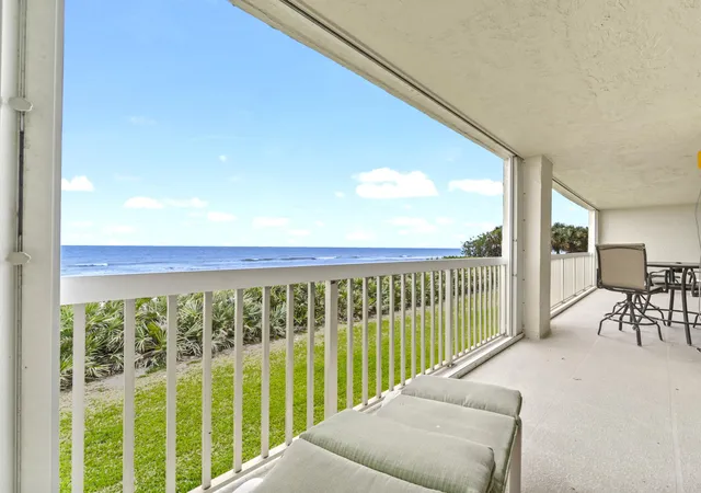 Listing Photo 1 - Condo for sale in building located at 407 Hwy A1A, Satellite Beach, FL 32937 - Unit #413