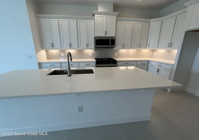 Photo 3 of Townhouse for sale at 3048 Pangea Cir, Melbourne, FL 32940 | MLS# 1029372 | Listing updated on 2026-09-10