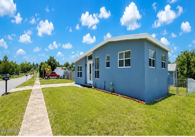 Photo 3 of Single family home for sale at 1064 Cabot Dr Ne, Palm Bay, FL 32905 | MLS# 1031473 | Listing updated on 2026-06-18
