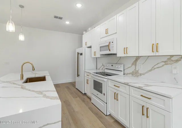 Photo 2 of Single family home for sale at 435 Goldsmith Ave Nw, Palm Bay, FL 32907 | MLS# 1035607 | Listing updated on 2026-06-09