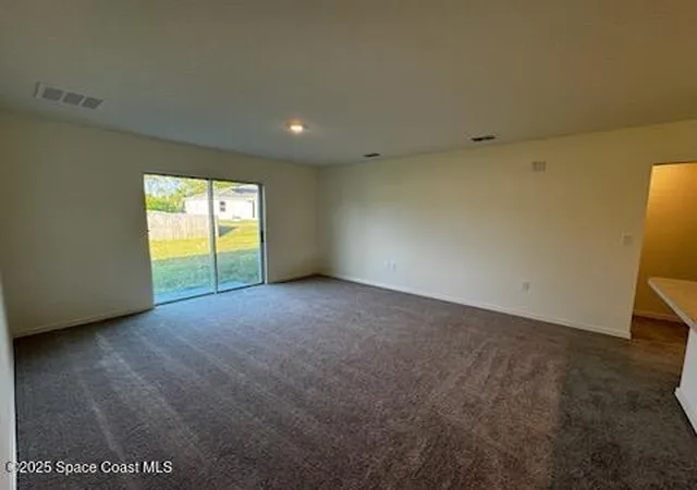 3rd image of 691 Flynn St Se, Palm Bay, FL 32909 | MLS# 1038341