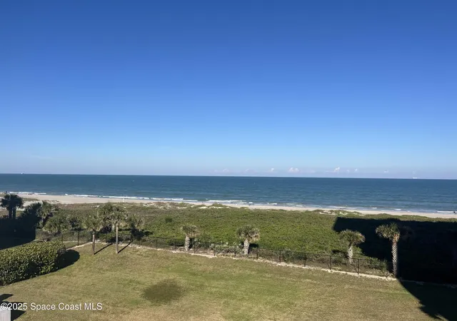 Listing Photo 1 - Condo for sale in building located at 840 N Atlantic Ave, Cocoa Beach, FL 32931 - Unit #C504