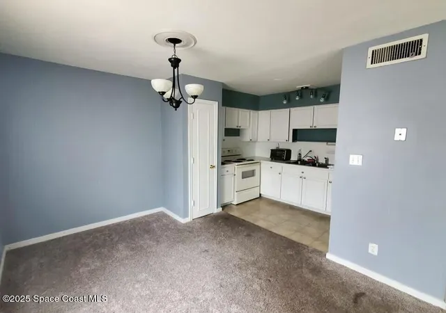 Photo 3 of Condo for sale at 125 E Colonial Ct #D, Indian Harbour Beach, FL 32937 | MLS# 1043666 | Listing updated on 2026-09-02